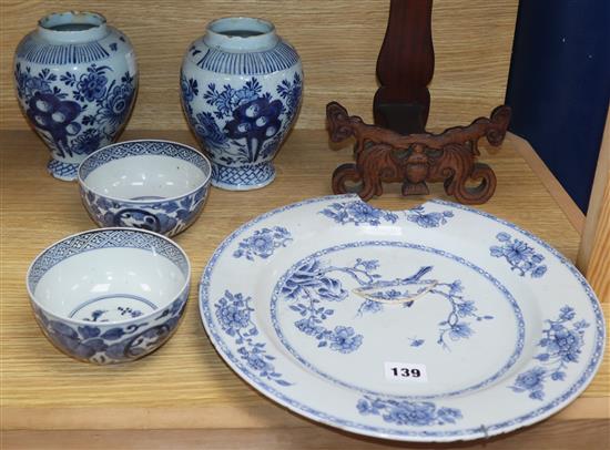 A pair of 18th century Delft blue and white vases, an 18th century Chinese blue and white dish and two Japanese bowls and a hongmu dish